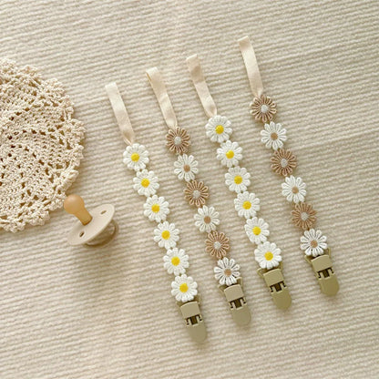 Attache tétine florale