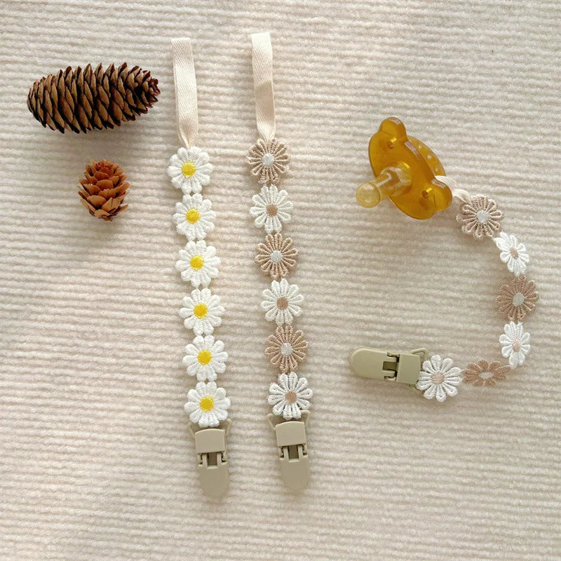 Attache tétine florale