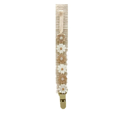 Attache tétine florale
