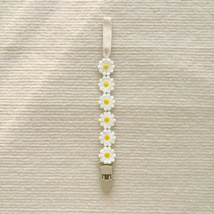 Attache tétine florale