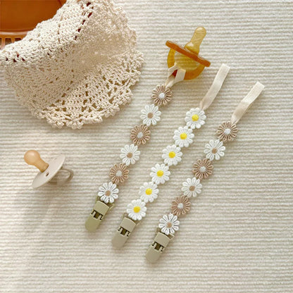 Attache tétine florale