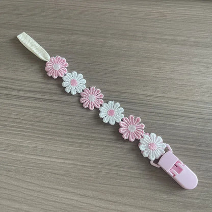 Attache tétine florale